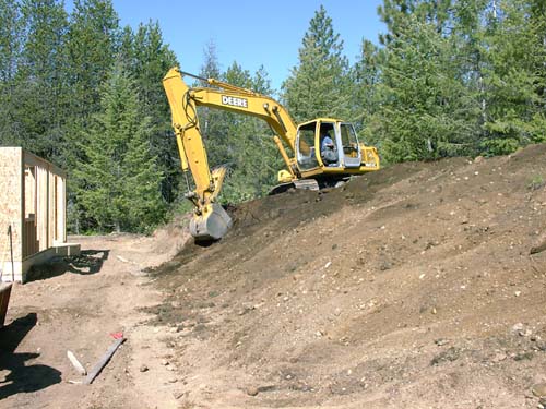 0046 - rough backsloping of rear yard