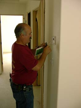 0187 - Jim installing the security system