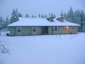 0276 - Snow's getting ready to slide off the house