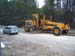 0325 - Our associations grader leveling the road